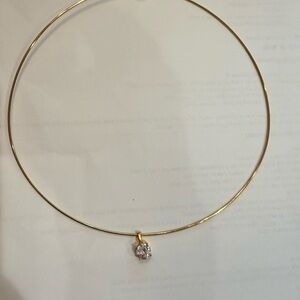Gold collar necklace with round cz pendant